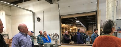 Woodworkers take a tour of the Treehouse Hardwoods mill and shop