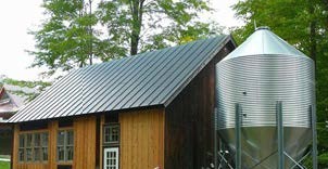 Outdoor pellet boiler installation heating one of Vermont's public schools
