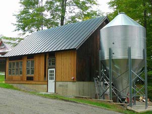 Outdoor pellet boiler installation heating one of Vermont's public schools